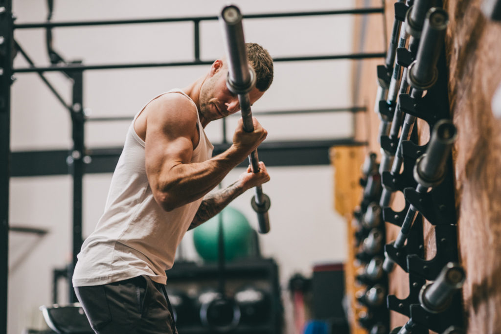 Cody barbell curling.