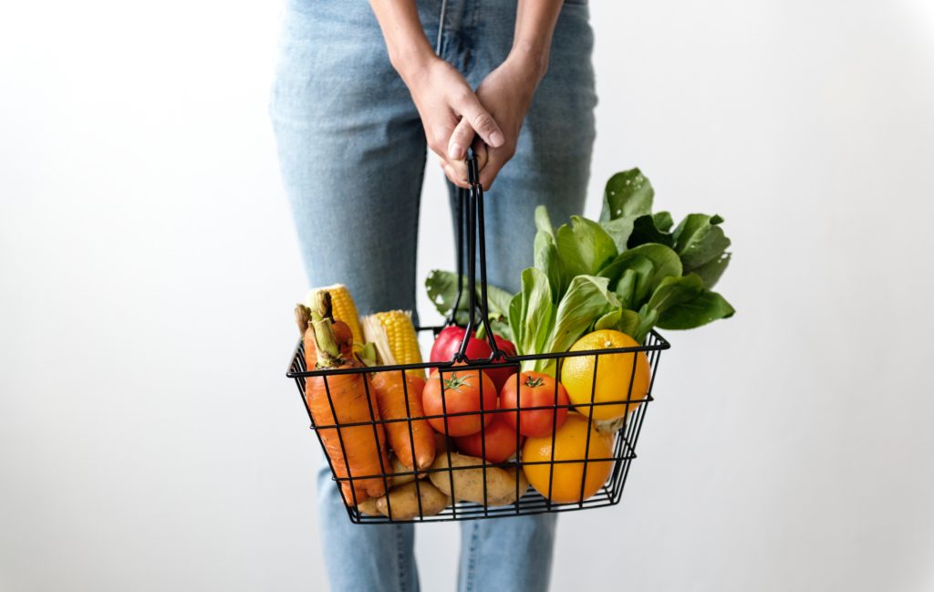 a healthy basket of food at the grocery store