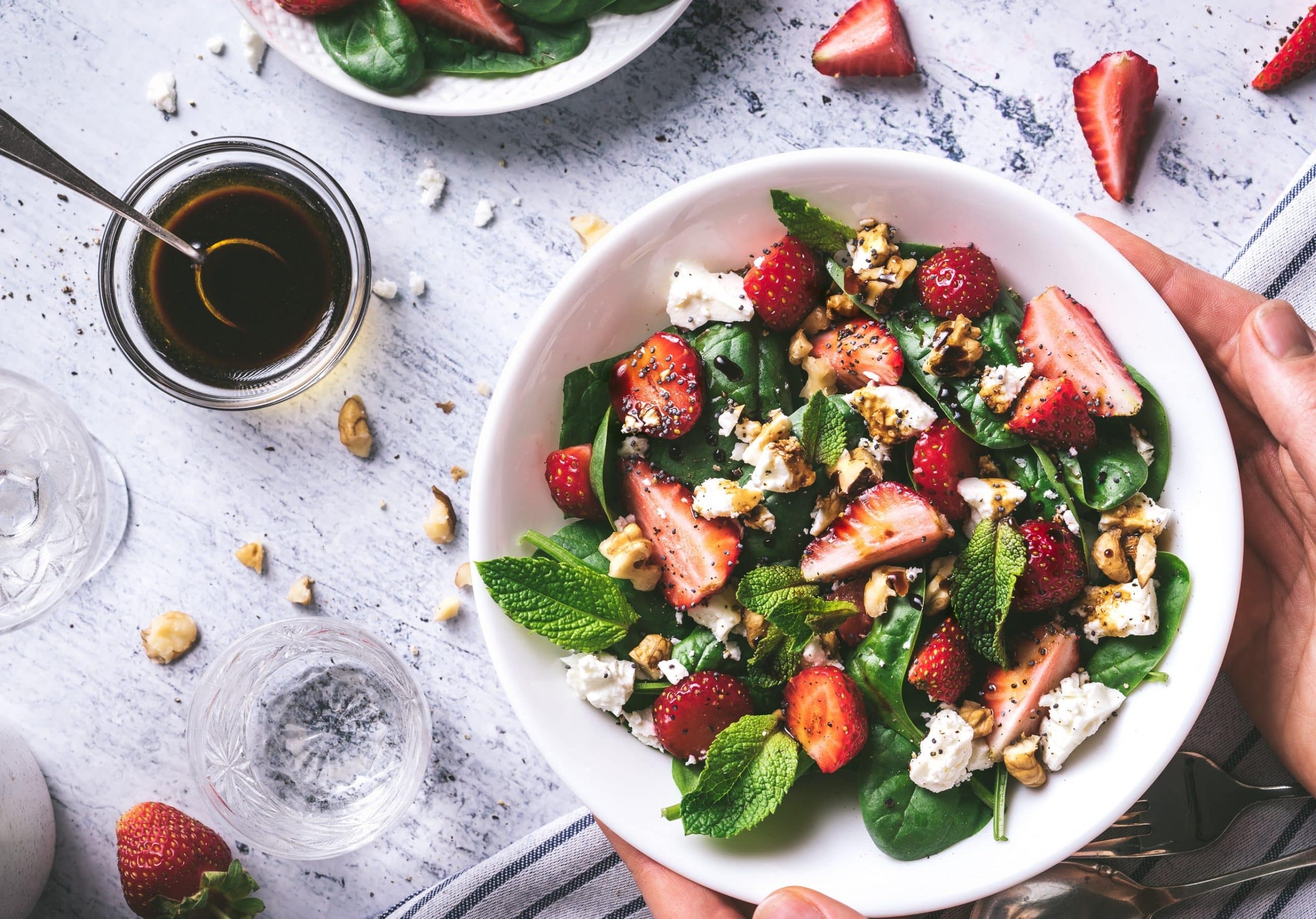 Image of a strawberry, chicken and walnut salad