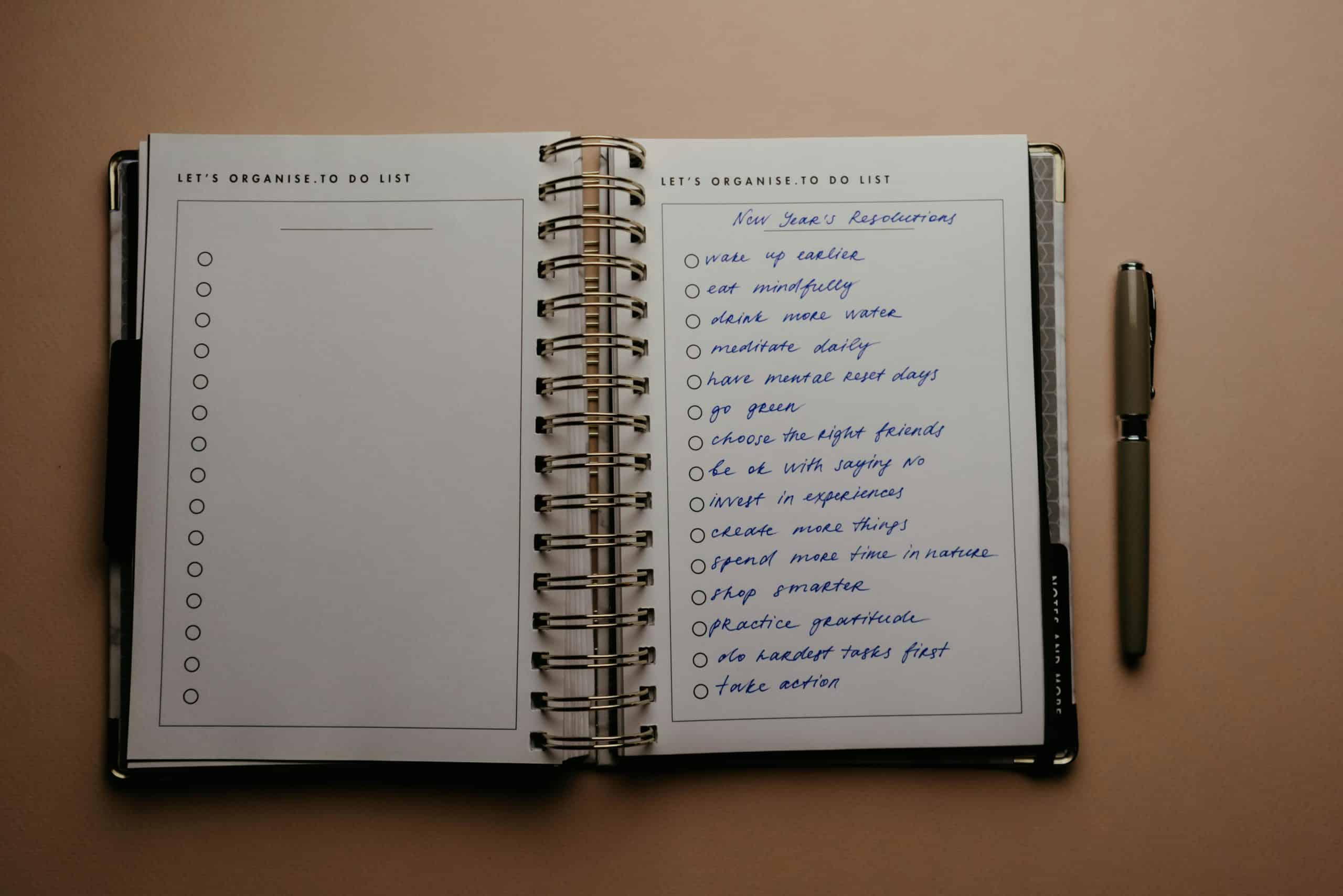 journal with checkboxes to track habits