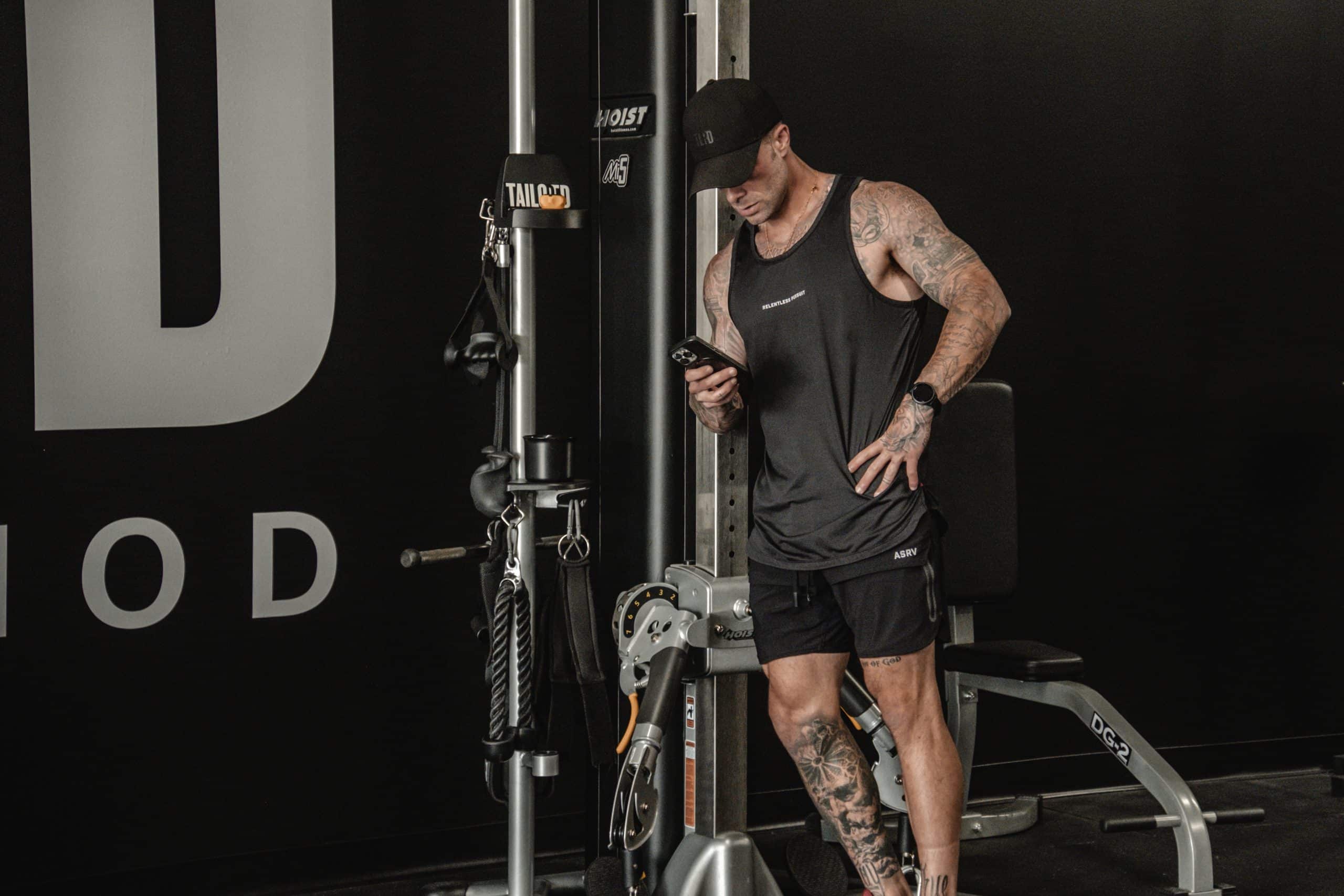 Online coach Cody McBroom reading his program from the Tailored Trainer App