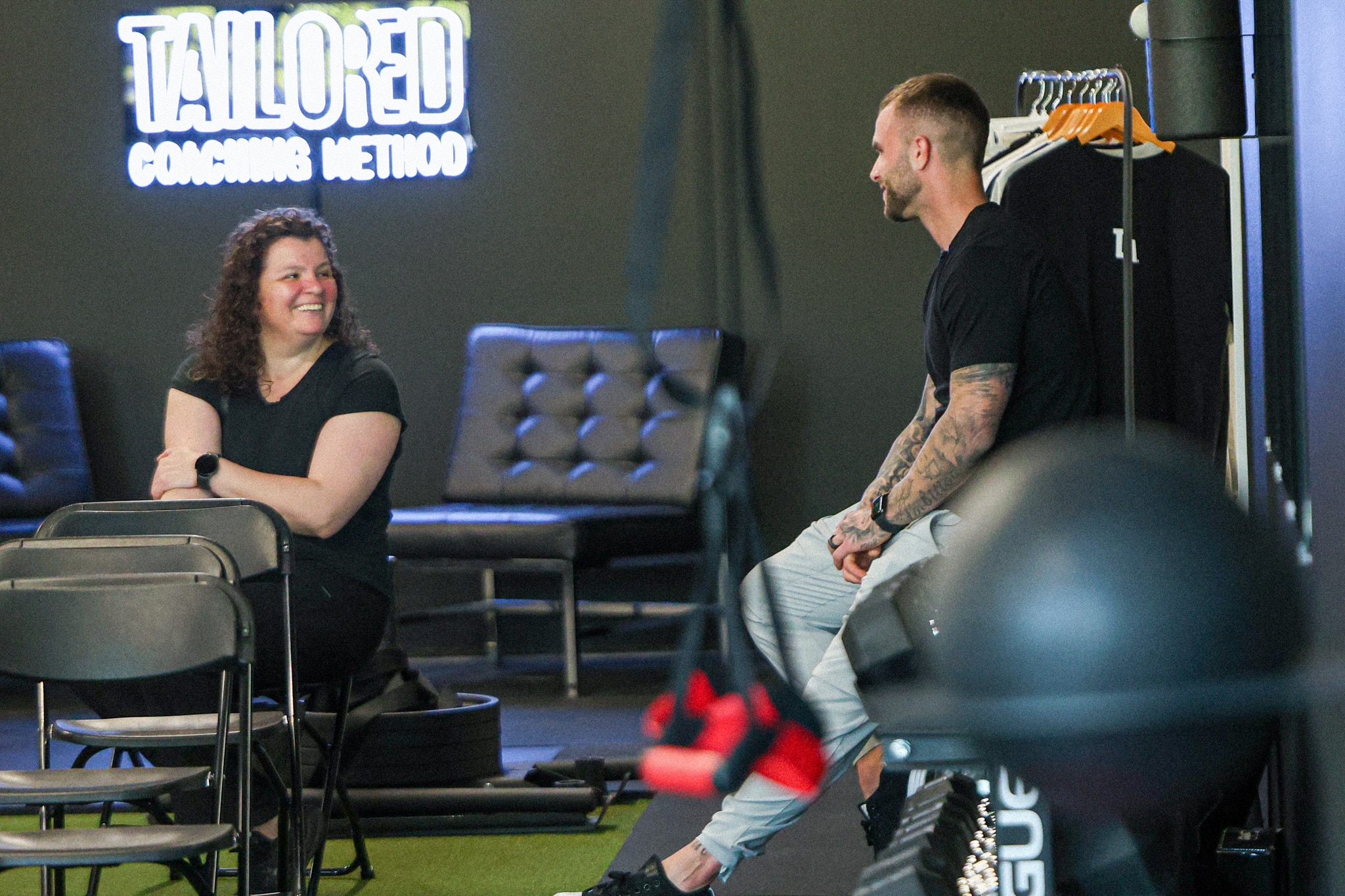 Cody McBroom, CEO of Tailored Coaching Method, connecting with members at the Tailored Coaching Method HQ in Buckley/Bonney Lake WA.