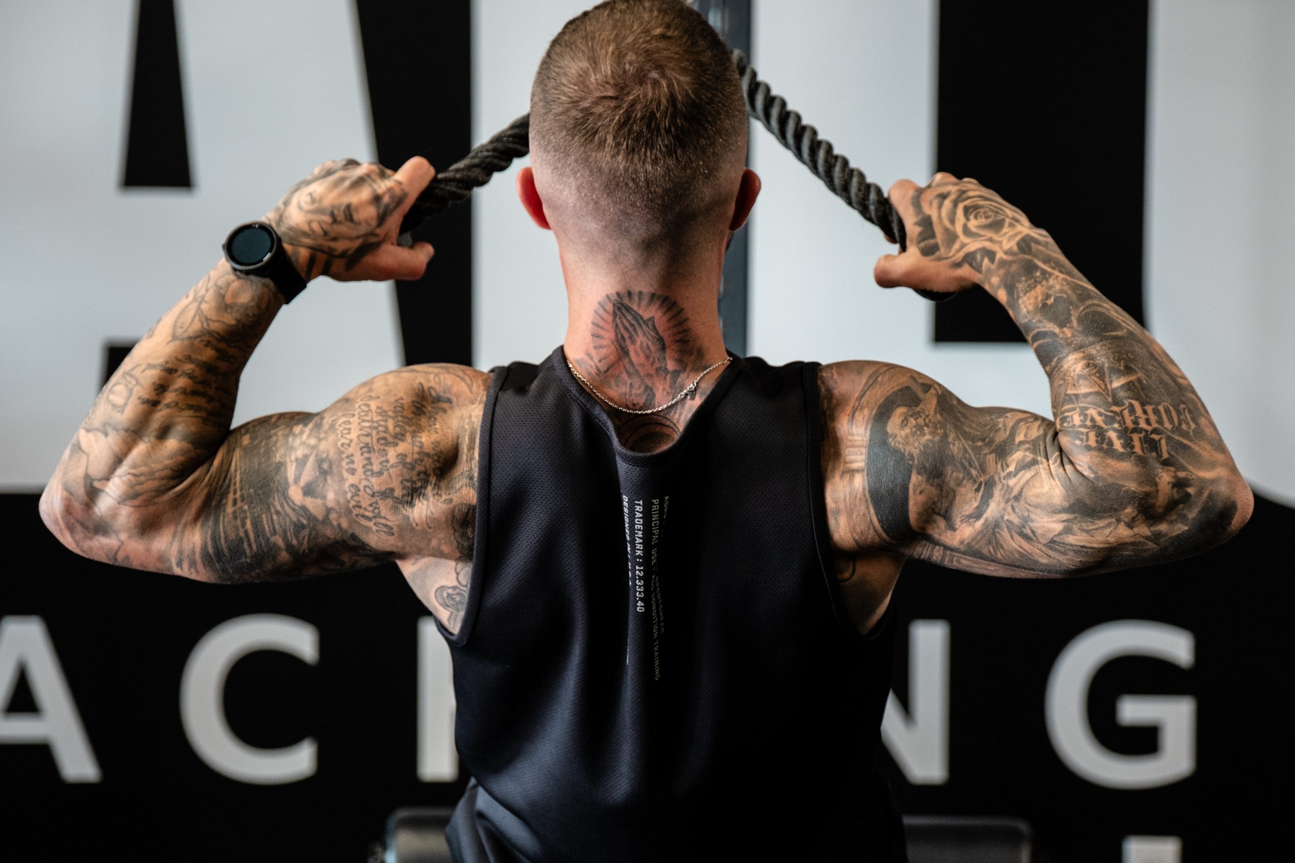 Cody McBroom of Tailored Coaching Method, performing face pulls